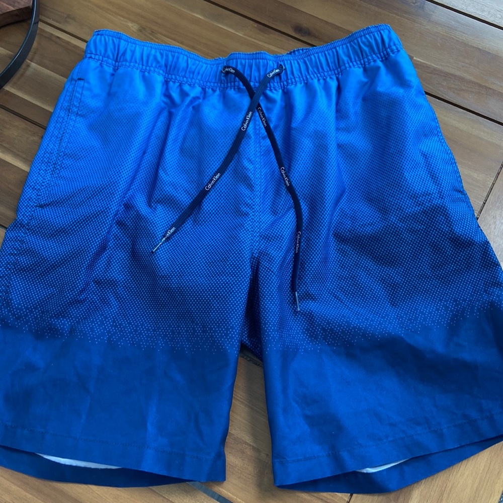 Calvin Klein swim trunks men’s size M, Blue, NWOT